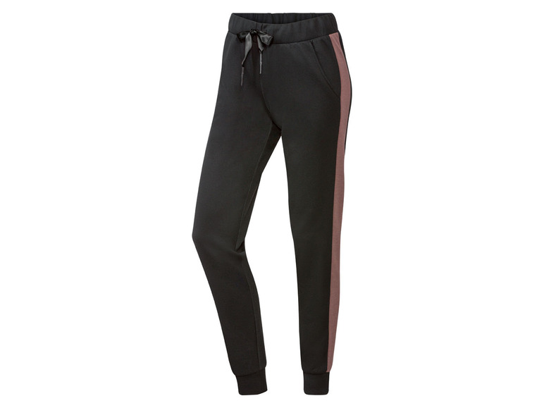 Pantalon de survêtement noir avec des rayures roses.