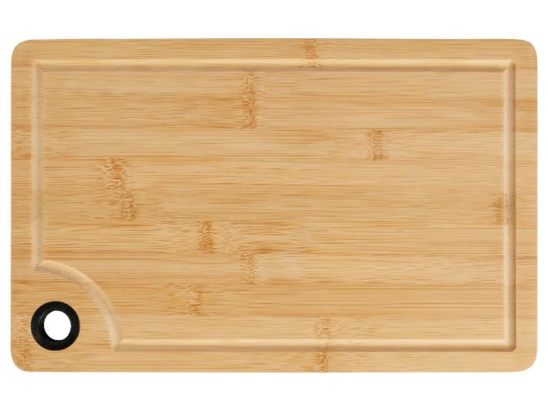 Planche à découper rectangulaire en bambou avec poignée.