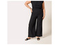 Pantalon large noir avec taille élastique.