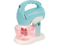 Robot pâtissier jouet turquoise et blanc avec un bol rose, texte « Mixer ».
