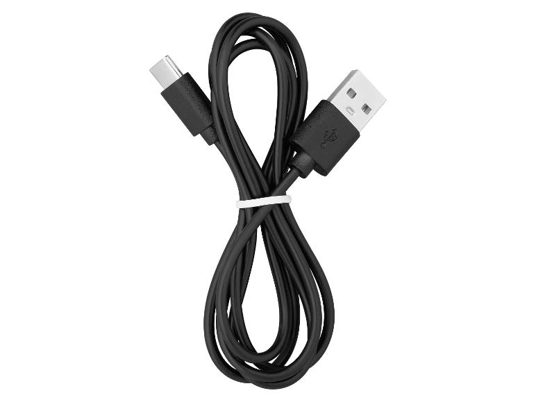 Câble noir USB-C vers USB-A, enroulé et attaché avec un lien blanc.