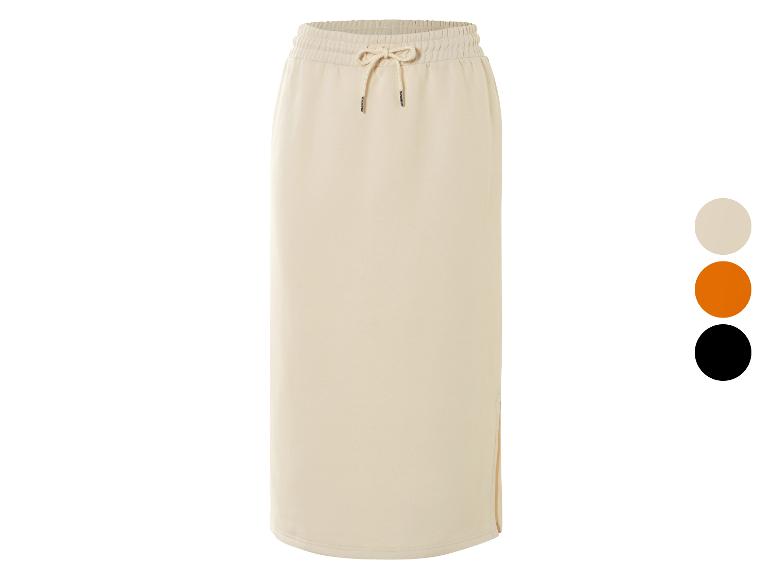Une jupe beige à cordon, disponible en plusieurs couleurs.