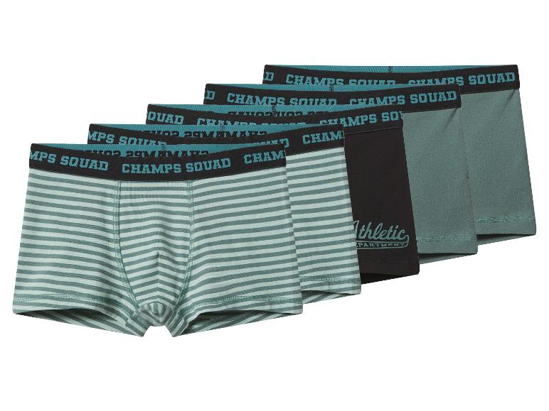 Cinq paires de boxers pour hommes en vert, noir et à rayures, avec des ceintures 'CHAMPS SQUAD'.