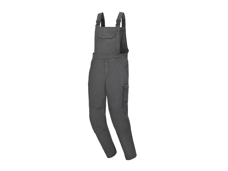 Salopette de travail gris foncé avec bretelles et poches latérales.