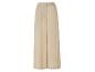 Pantalon large beige élégant.