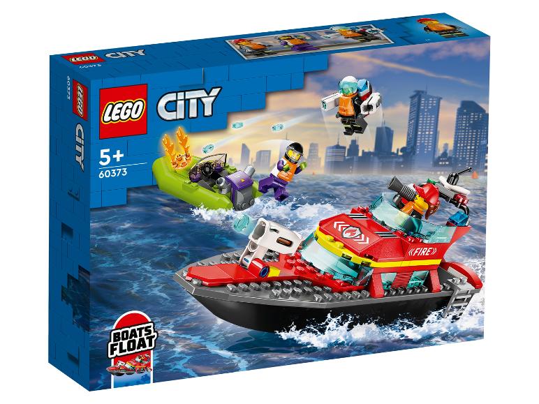 Boîte de jouets avec un bateau de pompiers rouge et un bateau pneumatique vert, avec figurines.