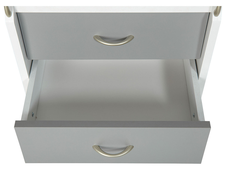 Une commode blanche à deux tiroirs gris.