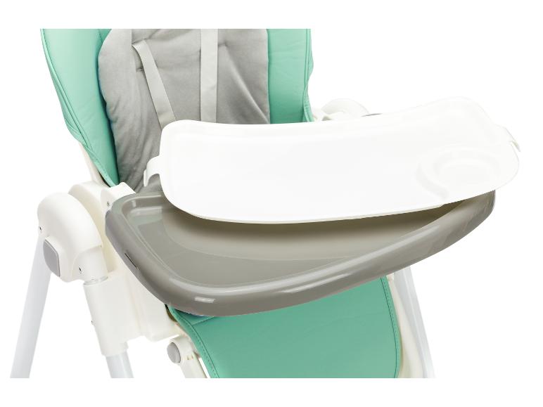 Une chaise haute pour bébé vert menthe et grise avec un plateau blanc amovible.