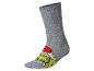 Chaussette grise avec un motif du Grinch portant un bonnet de Noël