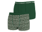 Deux boxers verts pour hommes, dont un avec un motif festif.