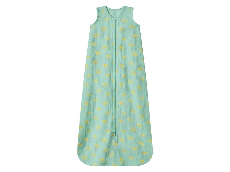 Gigoteuse bébé vert menthe avec motifs de soleil jaunes et fermeture éclair frontale.