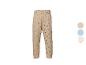 Pantalon de jogging beige à pois noirs, taille élastique et poignets.