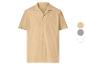 Chemise homme à manches courtes beige, avec col et boutons.