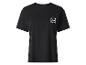 T-shirt noir à manches courtes avec un logo holographique sur la poitrine.