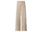 Pantalon palazzo beige taille haute avec boutons décoratifs.