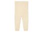 Leggings en tricot beige pour bébés.