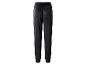 Pantalon de jogging en velours noir avec taille élastique et chevilles resserrées.