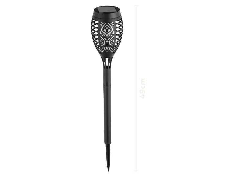 Lampe torche solaire de jardin noire, de 49 cm de haut.