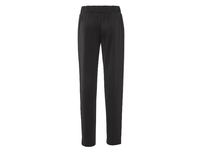 Pantalon noir avec taille élastique.