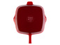 Une poêle en fonte rouge Le Creuset