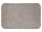 Un tapis de bain gris à texture douce.