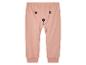 Pantalon rose pour bébé avec un adorable motif d'ours.