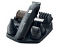 Un rasoir Remington avec plusieurs accessoires.