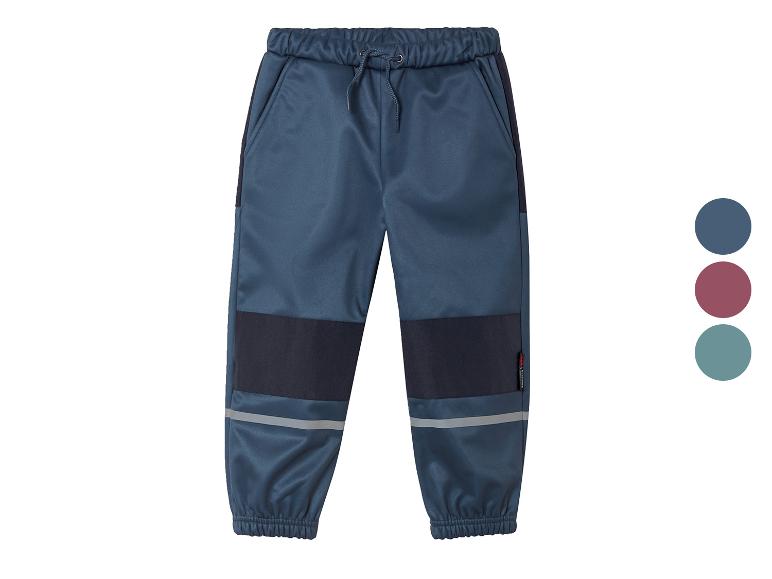 Pantalon softshell enfant bleu foncé avec détails.