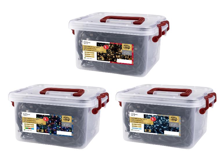 Guirlandes lumineuses LIVARNO home 400 LED en blanc chaud, coloré et blanc froid dans des boîtes de rangement transparentes.