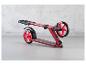 Trottinette rouge pliante avec roues noires.