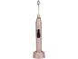 Brosse à dents électrique rose avec base de chargement, avec poils bleus et blancs.