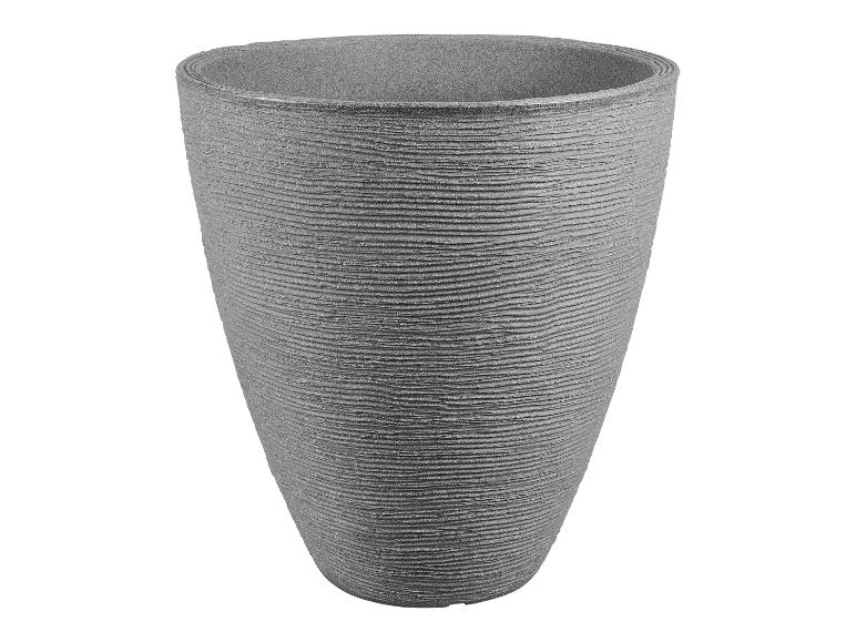 Pot de fleurs gris avec surface texturée