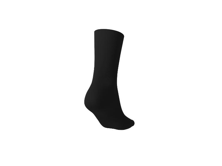 Chaussette noire unique sur fond blanc