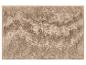 Un tapis de bain beige avec une texture moelleuse.