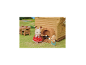 Lapin et ours en jouet rôtissant des guimauves devant une cabane en bois.