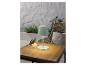 Lampe de table design pastel sur table en bois.