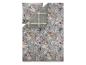 Parure de lit avec motif floral et oiseaux, et un imprimé à carreaux.