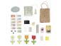 Ensemble de jeu de magasin avec caisse enregistreuse, argent, aliments et accessoires.