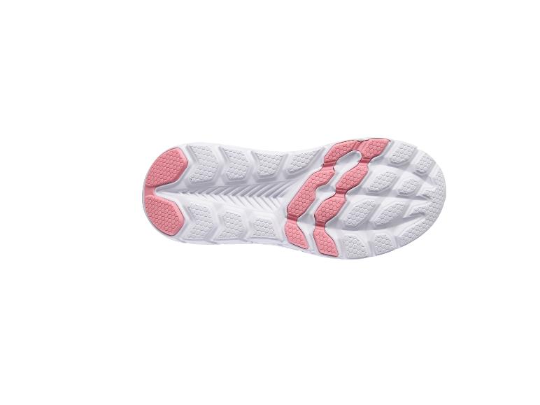 Semelle de chaussure de sport avec motif hexagonal blanc et rose.