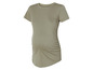 Un t-shirt vert clair pour femmes enceintes