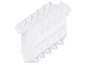 Quatre bodys blancs pour bébés.