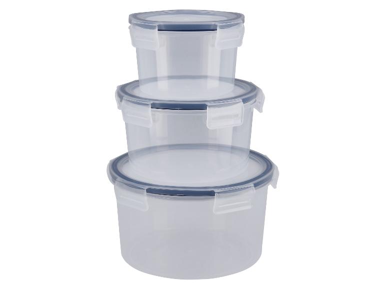 Trois contenants alimentaires en plastique transparent avec couvercles bleus.