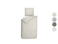 Une housse de couette beige avec un motif en zigzag et un oreiller assorti.