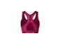 Un soutien-gorge de sport rose avec des panneaux en mesh.