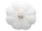 Coussin blanc moelleux en forme de fleur.