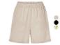 Shorts en lin beige, disponibles en plusieurs couleurs.
