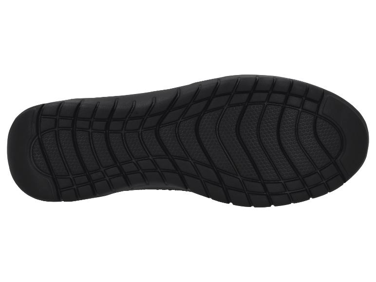 Semelle noire de chaussure de sport avec motif texturé