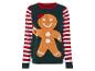 Un pull de Noël avec un motif de bonhomme en pain d'épices et des rayures rouges et blanches.