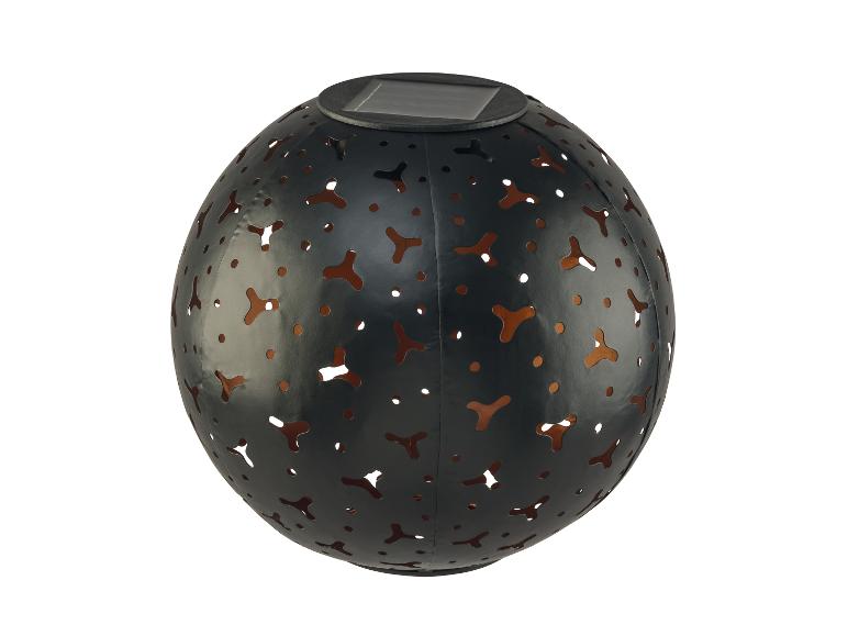 Lanterne solaire ronde en métal noir avec découpes décoratives
