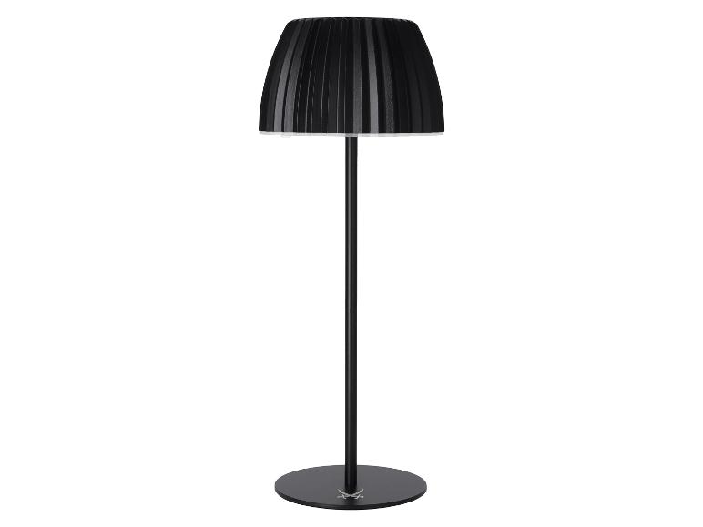 Lampadaire noir avec abat-jour plissé et base ronde.